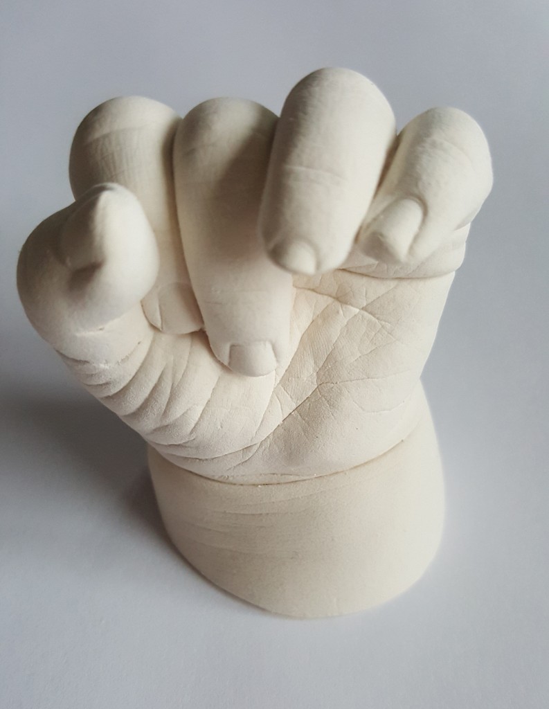 Unpainted baby hand cast