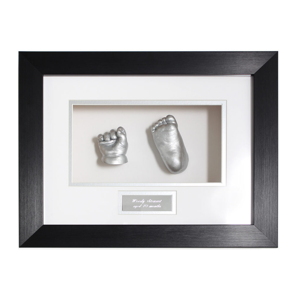 Baby cast frame - hand and foot in black and white