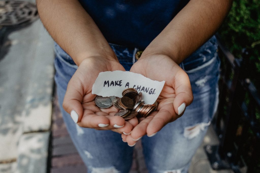 hands holding a charitable donation