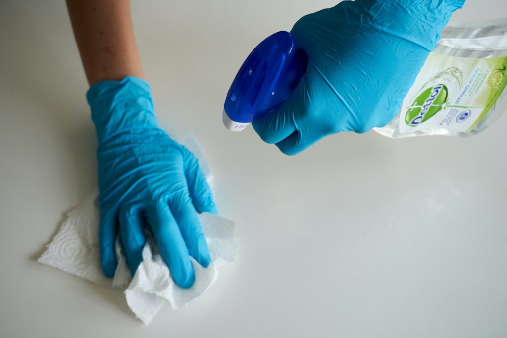 Cleaning products being used to sterilise a hard surface